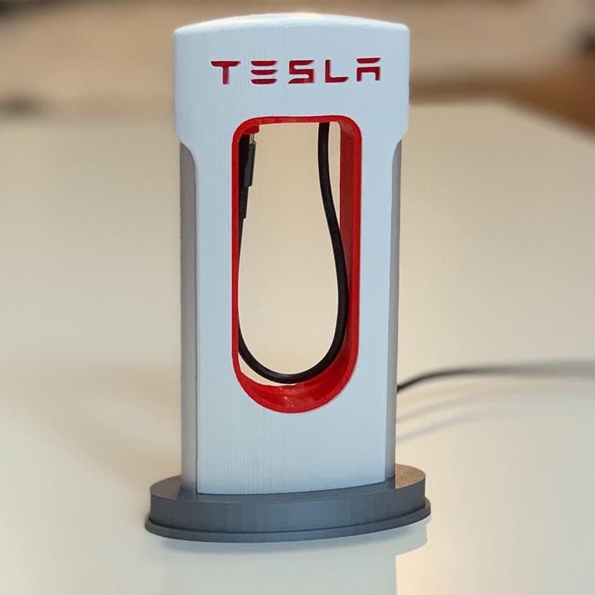 Tesla Supercharger telefontöltő állvány